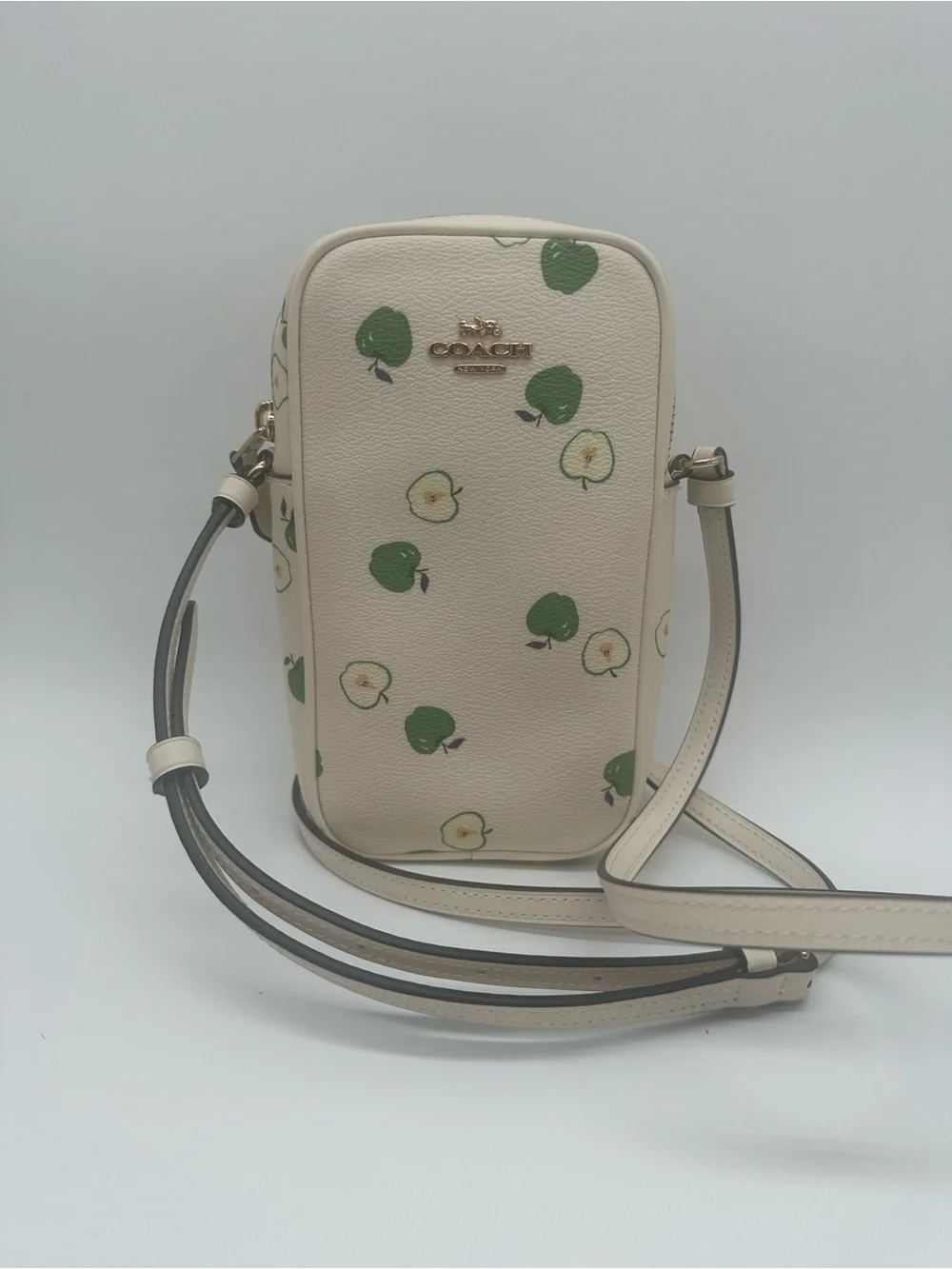 Coach Cream Crossbody Phone Pouch with Green Apple Motif